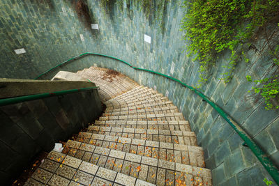 High angle view of steps by footpath