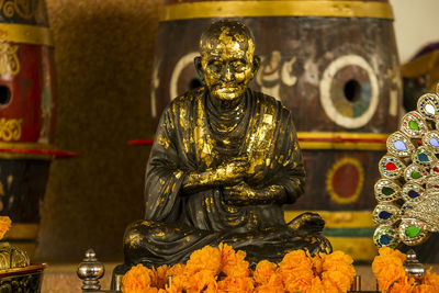 Statue against temple outside building