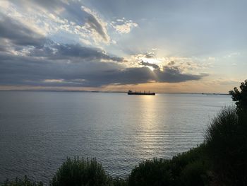 Scenic view of sea against sky during sunset