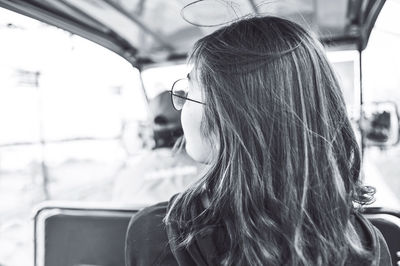 Portrait of woman in car