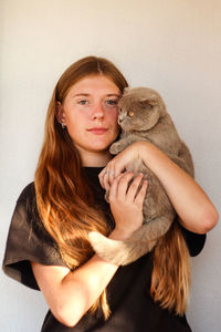 Portrait of young woman looking away