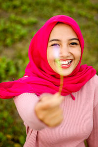 Portrait of a smiling young woman