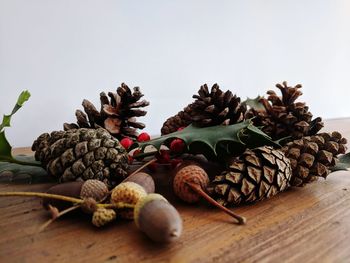 Close-up of pine cones on table