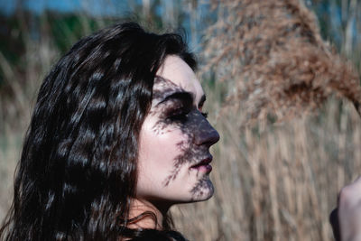 Close-up portrait of young woman