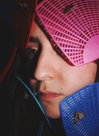 Close-up portrait of girl wearing hat