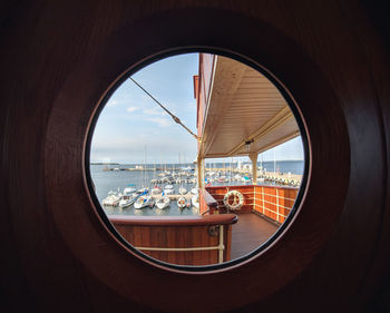 Panoramic view of sea seen through window