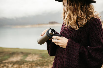 Woman photographing with camera