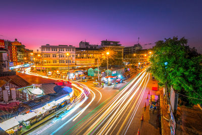 High angle view of light trails on road at night