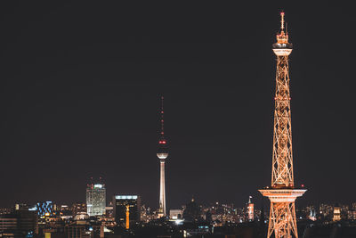 Cityscape against clear sky at night