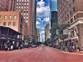 Road in city against sky