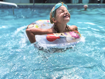 Woman swimming in pool