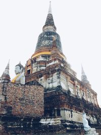 Sculpture of temple against sky