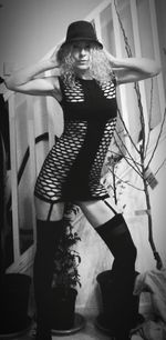 Woman standing at home