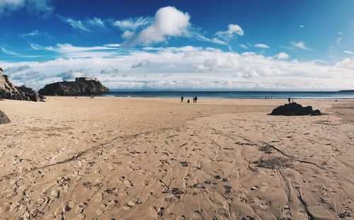 Scenic view of beach against sky