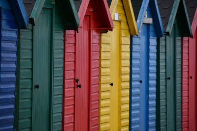 Full frame shot of multi colored huts on building