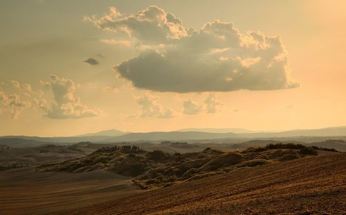 Aerial view of landscape against sky during sunset