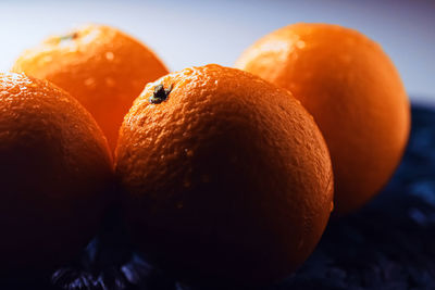 Close-up of oranges on table