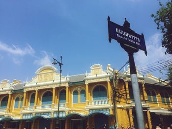 Low angle view of building against blue sky