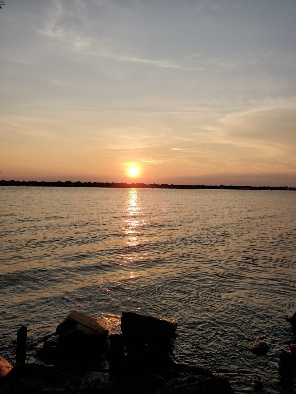 SCENIC VIEW OF SEA DURING SUNSET