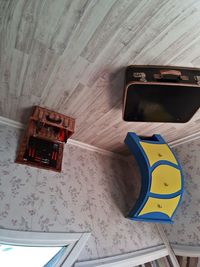 High angle view of smart phone on table at home