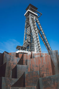 Low angle view of building against clear blue sky