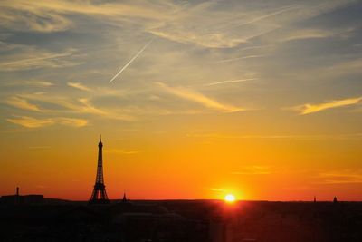 Scenic view of silhouette building against sky during sunset