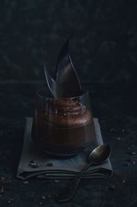 Close-up of dessert with spoons in glass