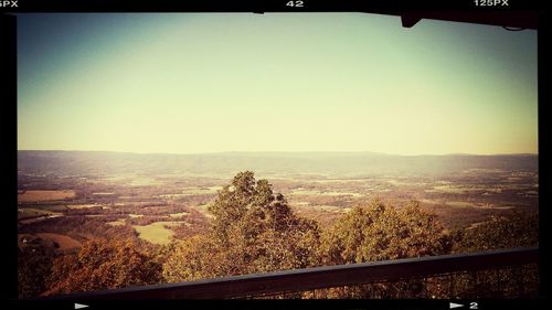 Scenic view of landscape against clear sky