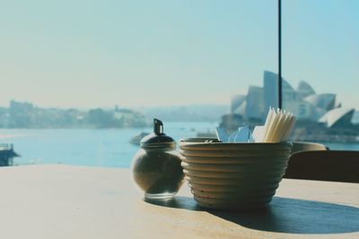 Close-up of cutlery in bowl on table