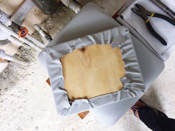 High angle view of garbage on paper