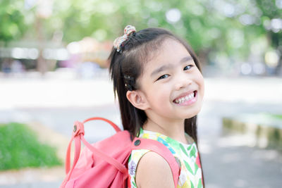 Portrait of cute girl smiling