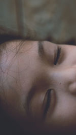 Close-up of woman with eyes closed