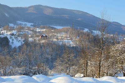 Scenic view of snow field against sky