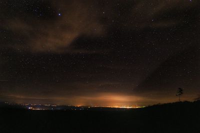 Scenic view of star field against sky at night