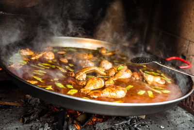 Close-up of meat in cooking pan