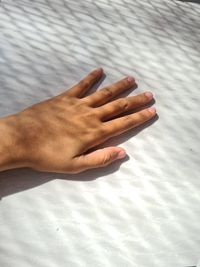 Hand under sunlight