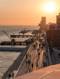 High angle view of people walking on beach