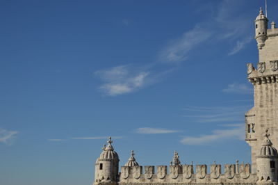 Low angle view of building against blue sky