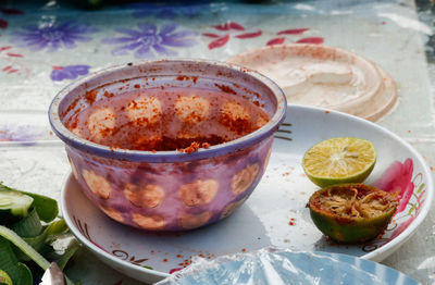 High angle view of fruits in bowl on table