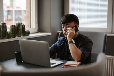 Man on the phone in office