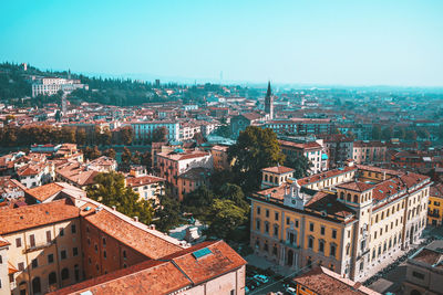 Sunny day in verona city centre, italy. panoramic view from above on old town streets and landmarks