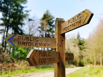 Information sign against trees