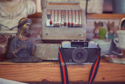 Close-up of camera on table