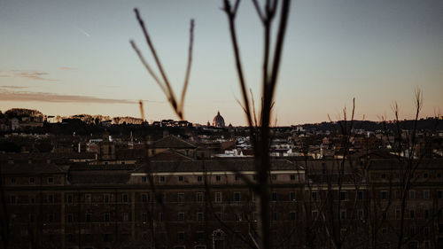 High angle view of buildings against sky at sunset