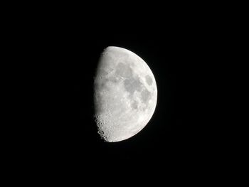 Low angle view of moon against sky at night