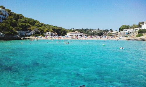 Scenic view of sea against clear blue sky