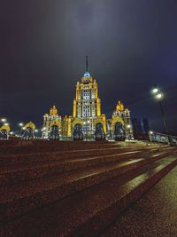 Illuminated buildings in city at night