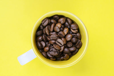 Coffee beans in a cup