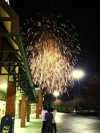 Firework display at night