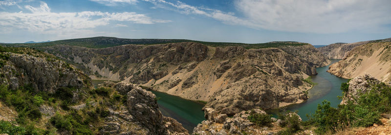 Panoramic view of mountains against sky